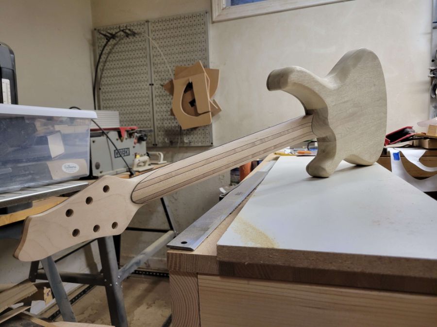 Back view of guitar with heel shaped