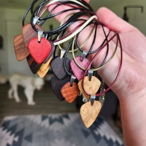 Handful of Wooden Guitar Pick Necklaces