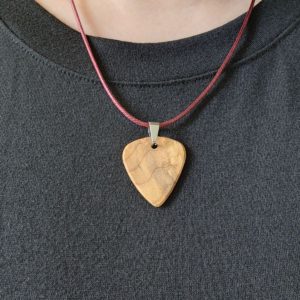 Wearing a Myrtle Burl Guitar Pick Necklace